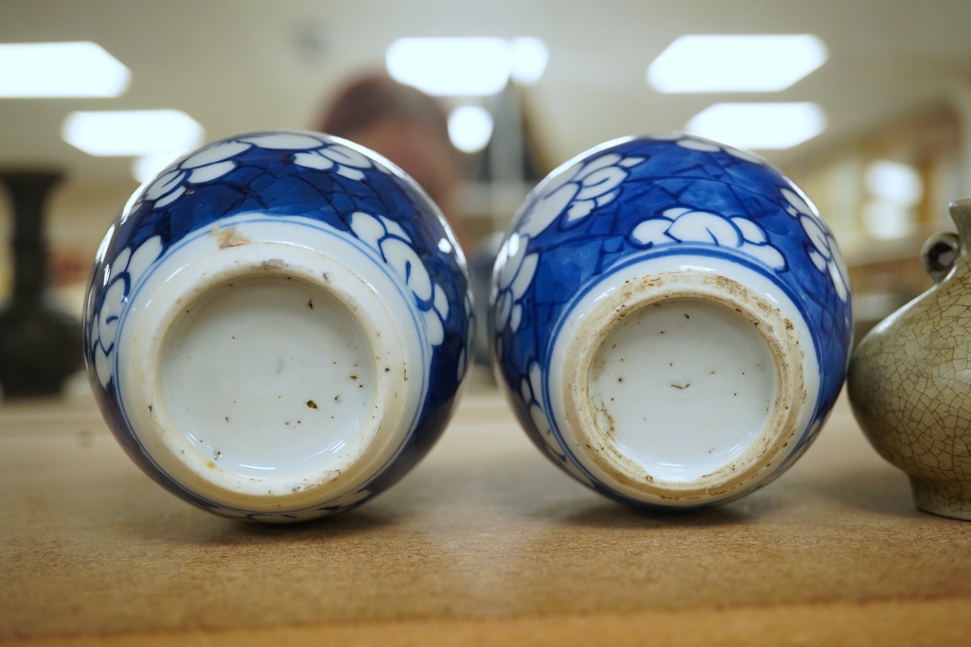 Two small Chinese blue and white prunus jars, Kangxi period, tallest 9.5cm. Condition - good